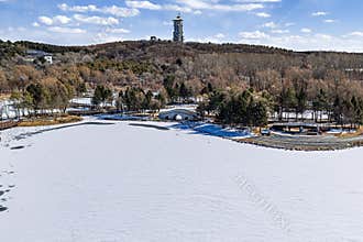 Early Spring Snow - View of the Tower at Jingyuetan National Forest Park, Changchun, China