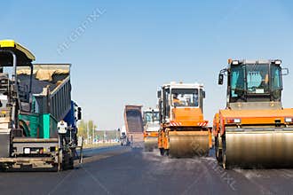 Road construction works with commercial equipment