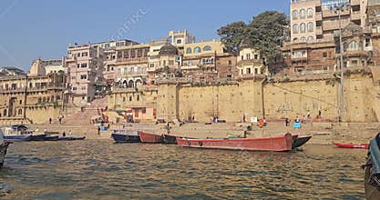 Varanasi or Banaras Ghats Riverside View from Boat on Ganges River, Colorful Boats and Historic Banaras City Scene