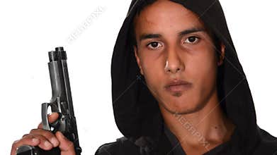 Portrait of young man with gun