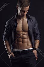 Strong Athletic Man Fitness Model Torso showing six pack abs.