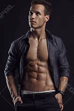 Strong Athletic Man Fitness Model Torso showing six pack abs.