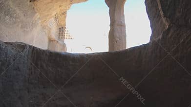POV walk through Cappadocia fairy chimneys and cave houses inside carved volcanic rock, goreme, turkiye, adventure