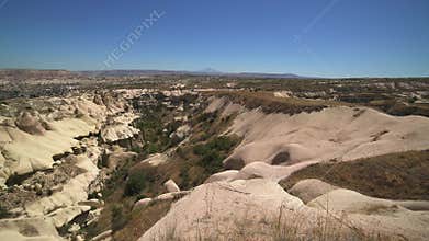 Cappadocia fairy chimneys and sculpted volcanic landforms appear in Turkiye, valley, badlands, rock formations, volcanic tuff