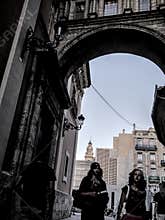 People going about their daily lives in the streets of the city of Valencia