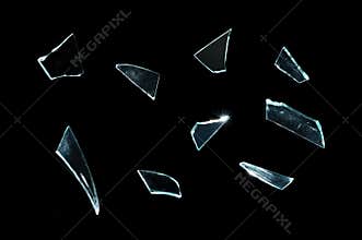 Broken glass with sharp Pieces over black