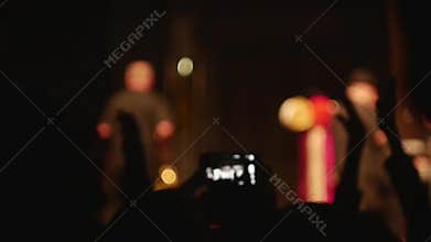 People dancing at open air rock festival
