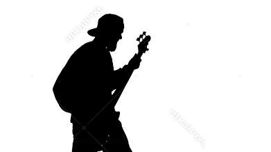 Silhouette of musician with bass guitar
