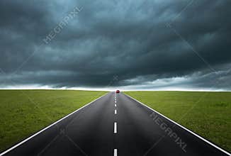 Road with cloudy sky
