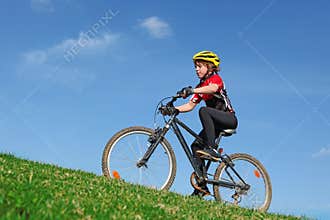 child cycling exercise on bike