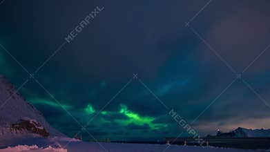 Northern Lights and Clouds in the Night Sky of Lofoten. Time Lapse