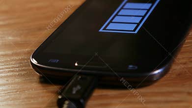 Smartphone on charging in rotation