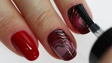 Nail art manicure with heart
