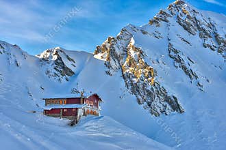 Chalet during winter at Balea Lake in the Fagaras mountains, Romania