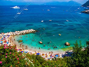 Crowded beach in Capri, Italy