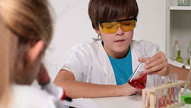 Elementary school chemistry class - kids experimenting