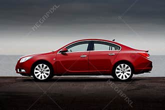 Side view of cherry red car