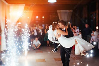 Happy bride and groom a their first dance, wedding