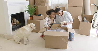 Young woman petting her pet dog
