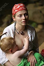 Mother breastfeeding child