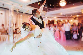 Happy bride and groom their first dance