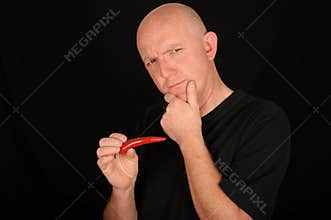 Man holding chili