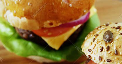 Two hamburgers on table