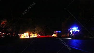 Scene of emergency with ambulance and flashing lights