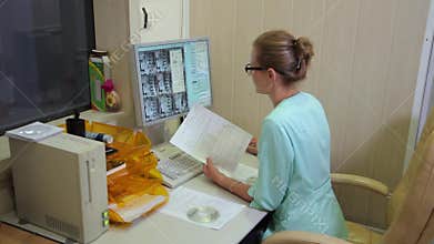 Computed tomography lab. Scan medical test /examination in a modern hospital. MRI machine and screens with doctor.