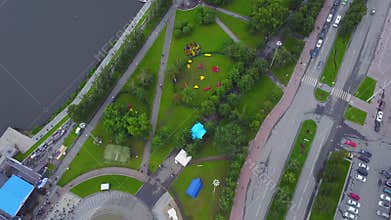 Day traffic city, modern buildings. Life in the city aerial view. Top view of motion people in the city