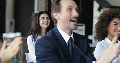 Group Of Business People Applauding At Conference Meeting, Seminar Listeners Greeting Speaker Clapping Hands In Office