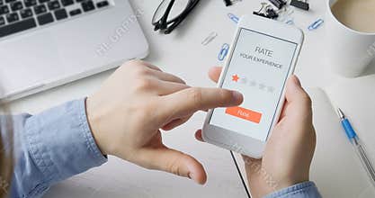 Man gives one star rating using smartphone application