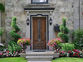 Front door with flowers