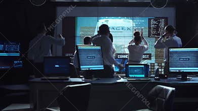 People celebrating in flight control center