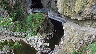 4K. Beautiful Skocjan Caves and bridge over the karstic river, Natural Heritage Site in Slovenia. Panoramic view