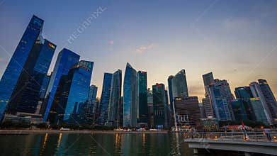 Day to night time-lapse of central business district building of Singapore city