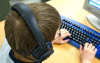 Computer Kid w/ Headphones