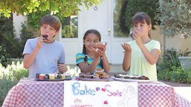 Children Holding Bake Sale