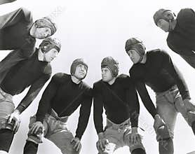 Low angle view of football huddle