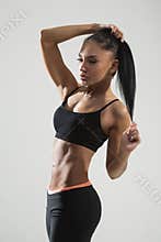 Attractive fitness woman, trained female body