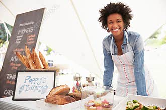 Female Bakery Stall Holder At Farmers Fresh Food Market