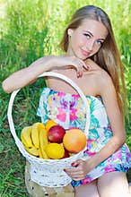 Happy girl and healthy vegetarian food, fruit