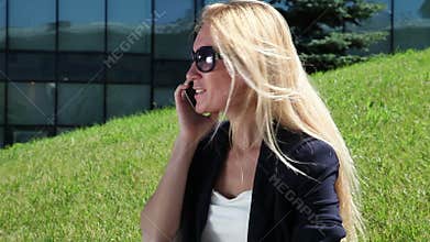 Young woman talking on cellular phone