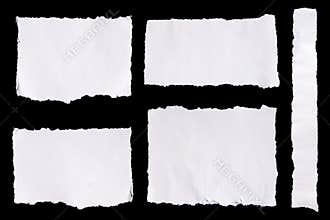 Collection of white ripped pieces of paper on black background