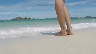 Close up woman walk to beach