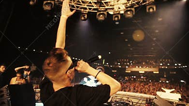 Dj with Mc at stage. Mc greets the audience