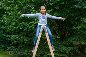 Young girl on relays happy playing