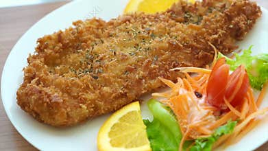 Fried battered Fish and colourful salad