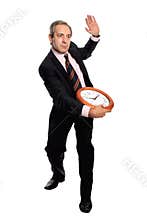 Man holding a clock