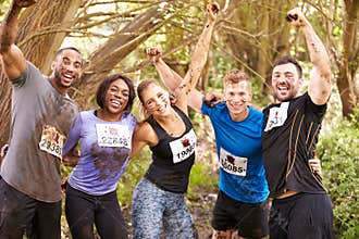 Competitors celebrate completing an endurance sports event